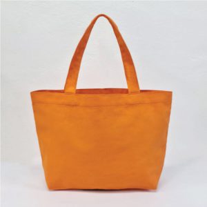 หน้าตรงกระเป๋าผ้าเเคนวาสสีล้วน แนวนอน สีส้ม